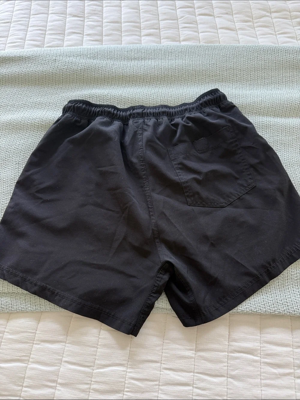 Youth Bruce Bolt black athletic shorts with built in liner
